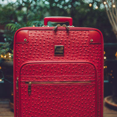 The Crown Collection Red Roller Luggage